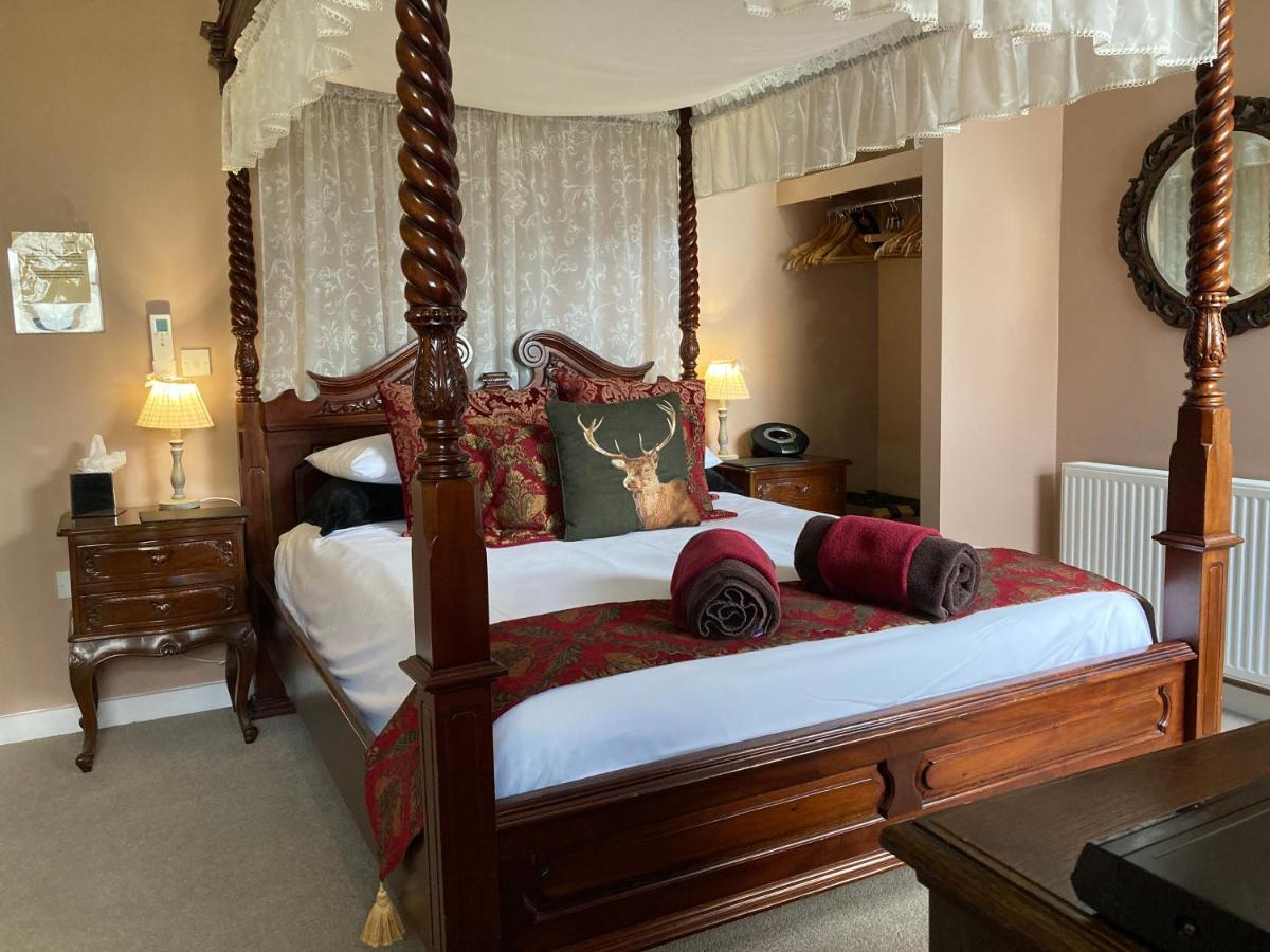 Deluxe Room with Four-Poster Bed,1197346879:JPEG