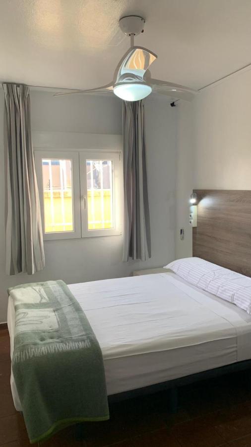 Queen Room with Shared Bathroom