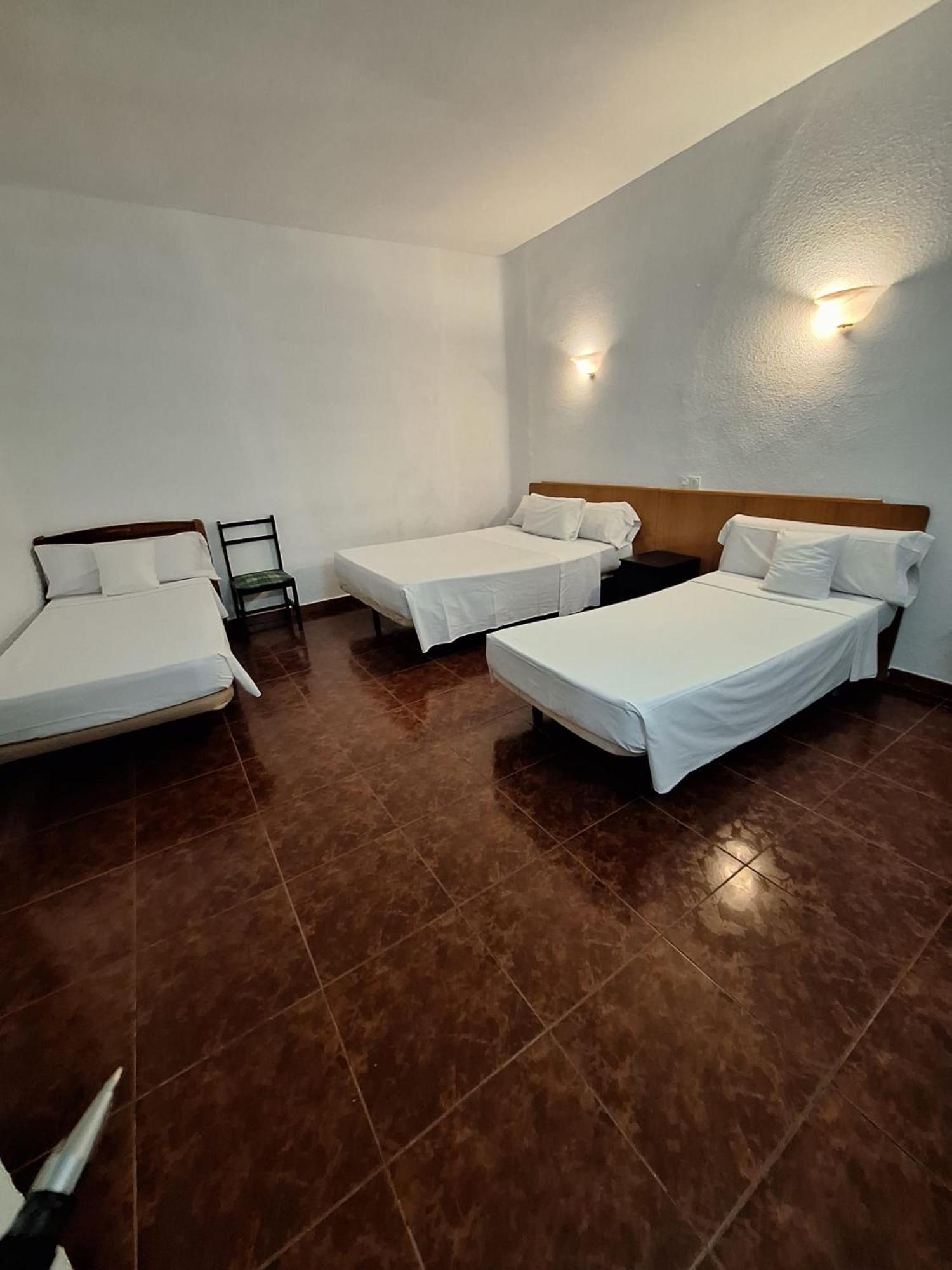 Quadruple Room with Shared Bathroom
