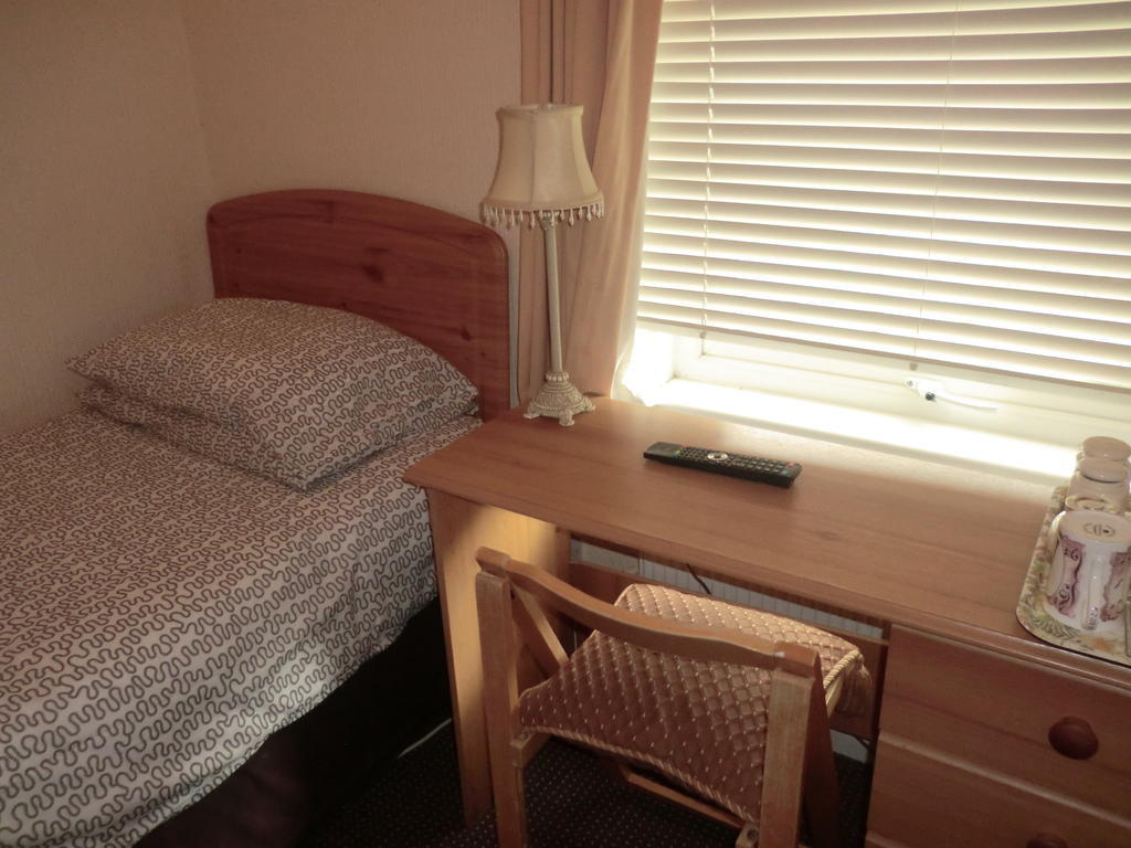 Single Room with Shared Shower and Toilet