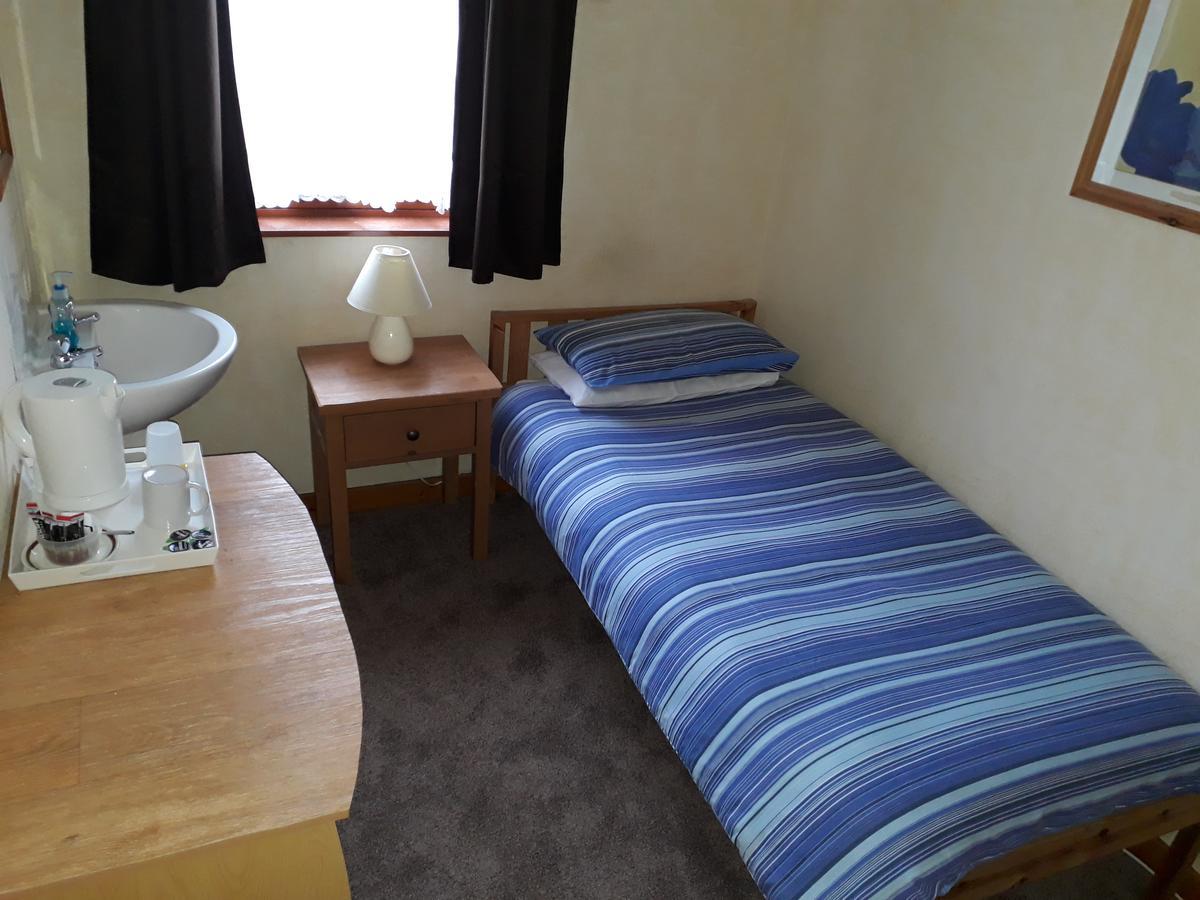 Single Room with Shared Shower and Toilet