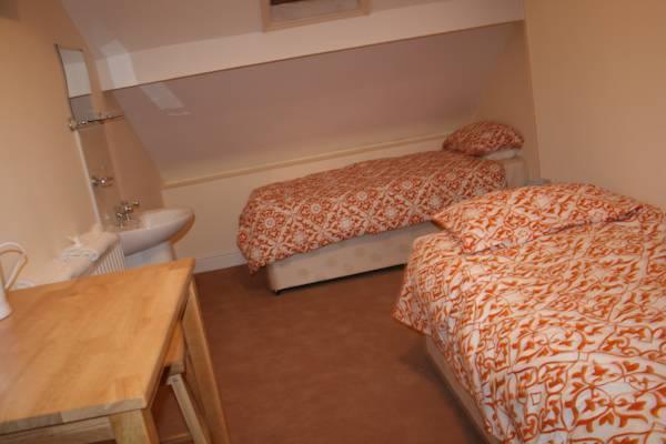 Economy Quadruple Room with Shared Bathroom